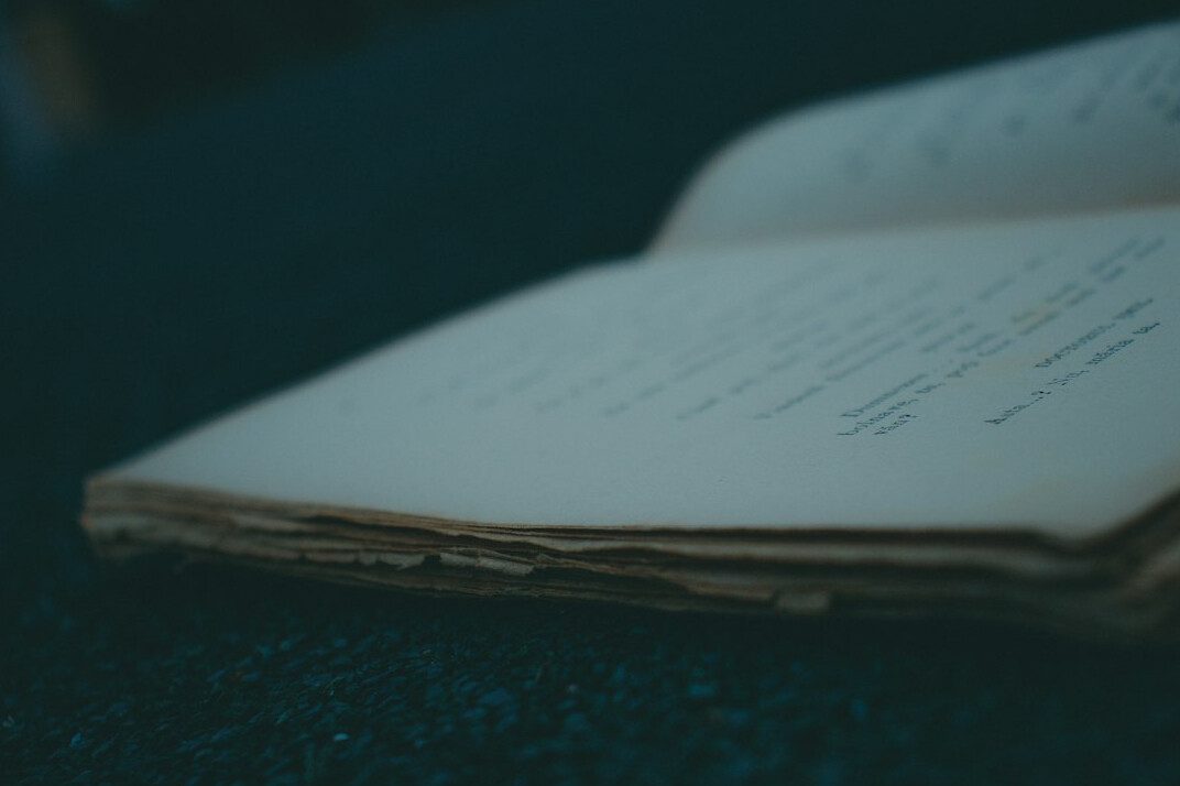 old book on table at night
